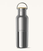 Klean Kanteen 16oz reusable stainless steel reflect water bottle available at Babipur with a smooth top half finish and a glossy bottom half finish. Features a handy loop cap with a bamboo top. 