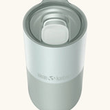 Klean Kanteen 16oz tumbler in barely blue showing a matching splash proof slide lid on top