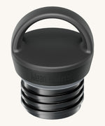 A close up of the Klean Kanteen black loop cap that fits on the 20oz classic rise bottle showing and loop handle detail