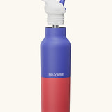 Klean Kanteen Dazzling Blue Rise Insulated Classic Bottle with Flip Seal Cap raised, showing reusable and removable metal straw.
