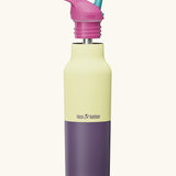 Klean Kanteen Wax Yellow Rise Insulated Classic Bottle with Flip Seal Cap raised, showing reusable and removable metal straw.
