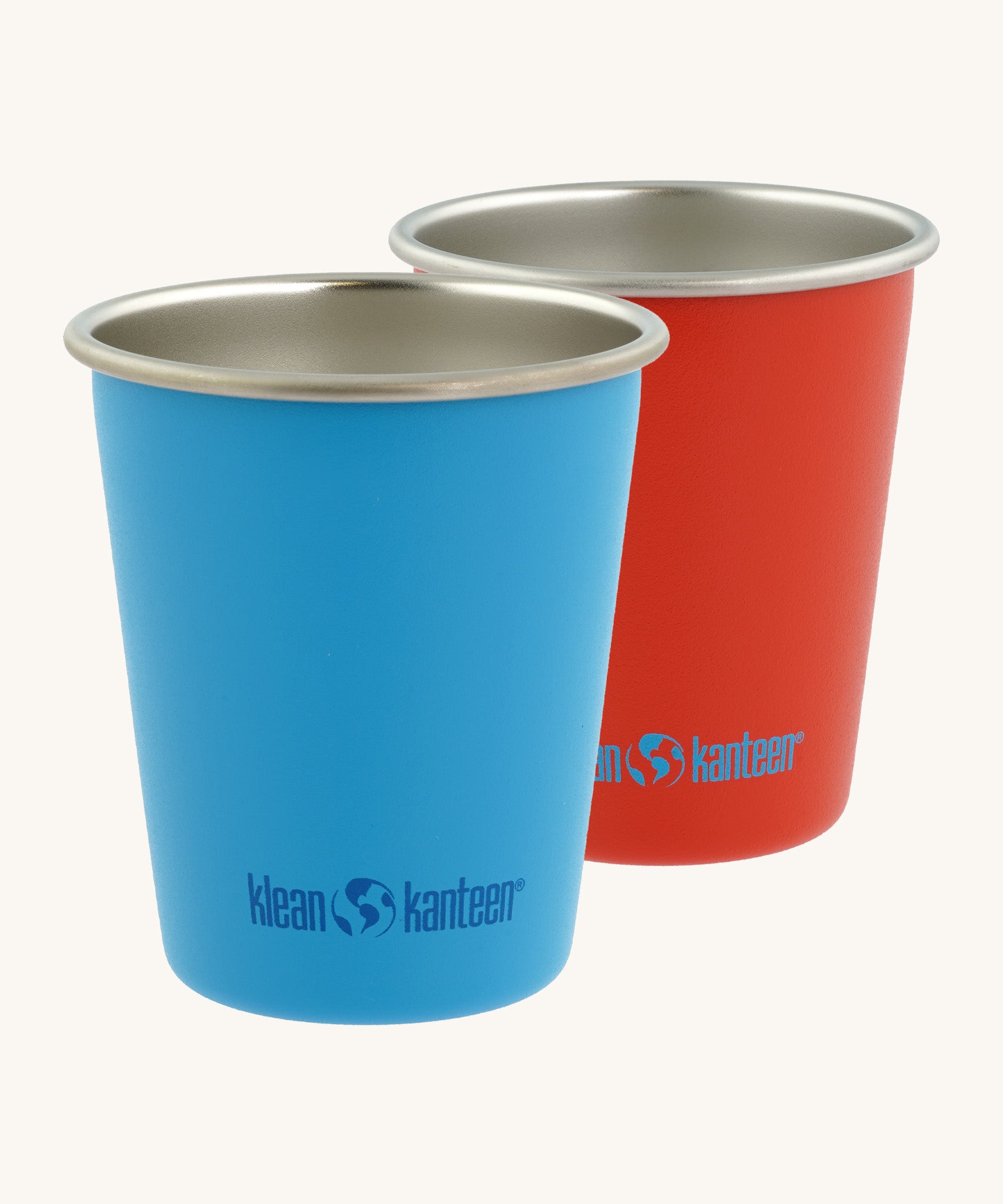 Pair of Klean Kanteen stainless steel 10oz kid cups in red and blue - durable, plastic-free tumblers made from post consumer steel, available to buy from Babipur.