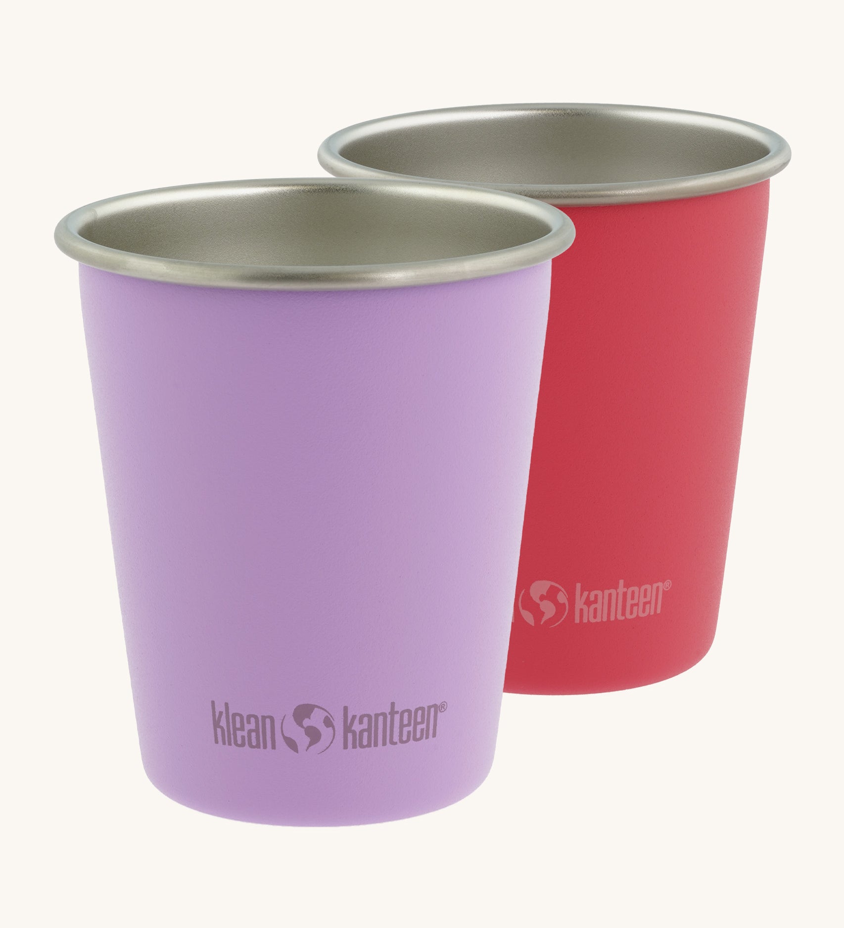 Two Klean Kanteen stainless steel 10oz kid cups in pink and purple - durable, plastic-free tumblers made from post consumer steel, available to buy from Babipur.