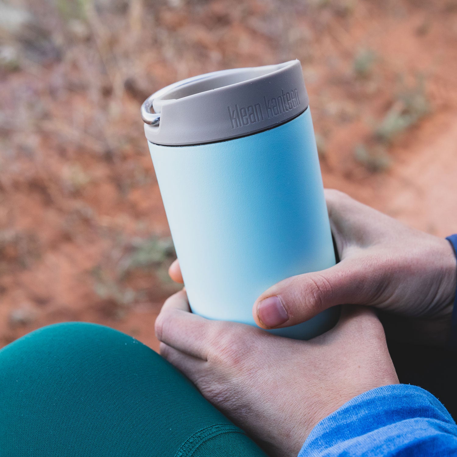 A Klean Kanteen TKWide Café Cap in a grey Taupe colour pictured on a TKWide bottle.