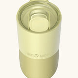 Klean Kanteen 16oz tumbler in wax yellow showing a matching splash proof slide lid on top