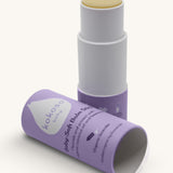 An open Kokoso baby soft balm stick available at Babipur showing the consistency of the balm. Comes in a lovely lilac twist tube