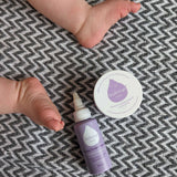 Kokoso Happy Scalp Cream in a 50ml container next to a small tub of Kokoso organic coconut oil. The Kokoso baby care range is available at Babipur.