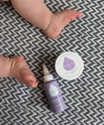 Kokoso Happy Scalp Cream in a 50ml container next to a small tub of Kokoso organic coconut oil. The Kokoso baby care range is available at Babipur.