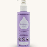 A bottle of the  Kokoso fragrance coconut oil baby lotion available at Babipur. Bottle features a push down dispenser 