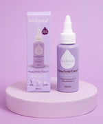 Kokoso Happy Scalp Cream in a 50ml container next to the cardboard packaging box. The Kokoso baby care range is available at Babipur.