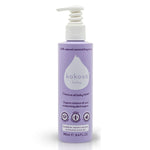 Kokoso organic coconut oil baby lotion bottle on a white background