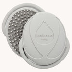 Kokoso Silicone Textured Baby Bath Brush, on a cream background