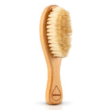 Kokoso natural wooden baby hairbrush on a white background