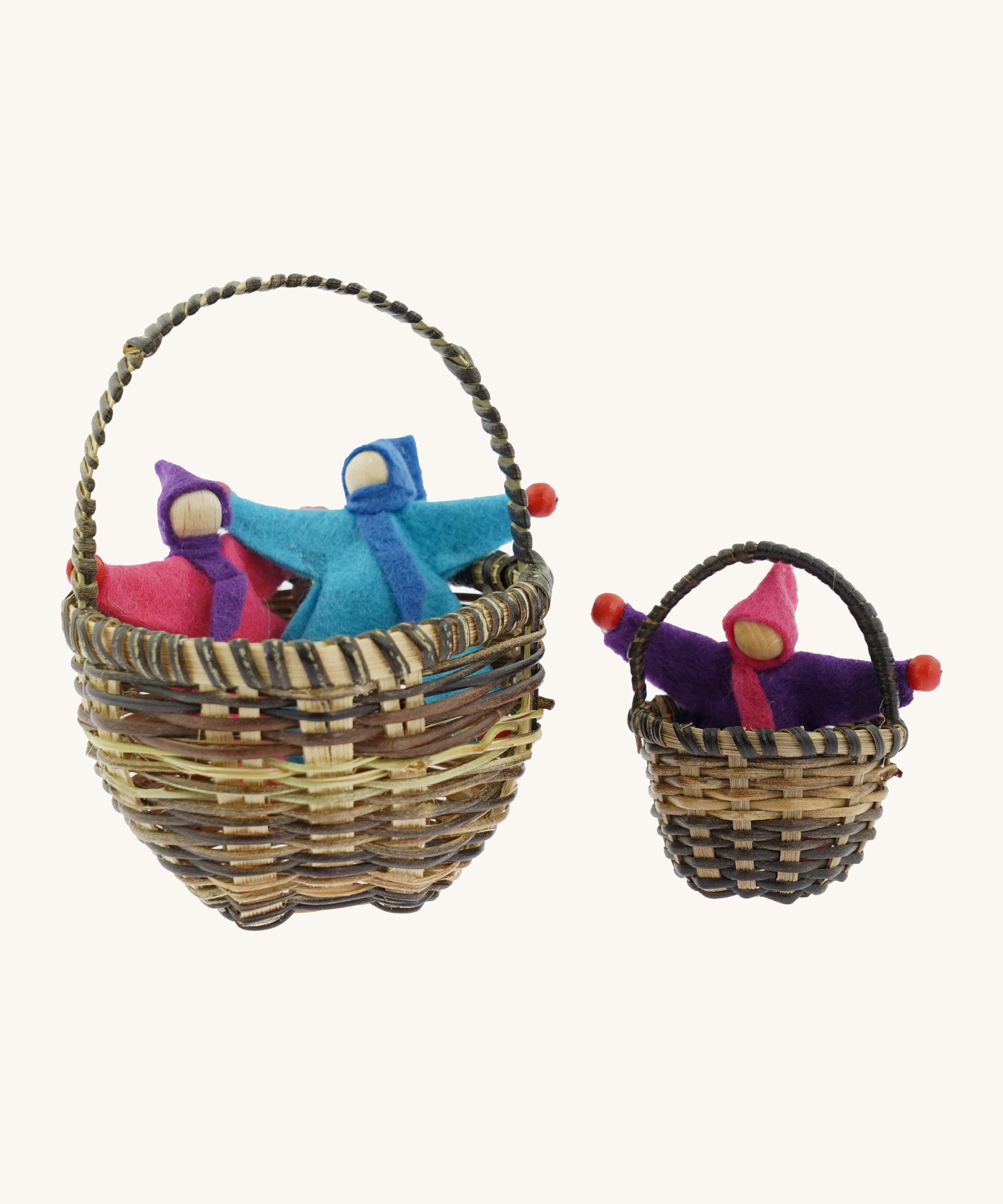 Kraul large and small replacement baskets made from whicker. Showing the passenger dolls sitting in the baskets
