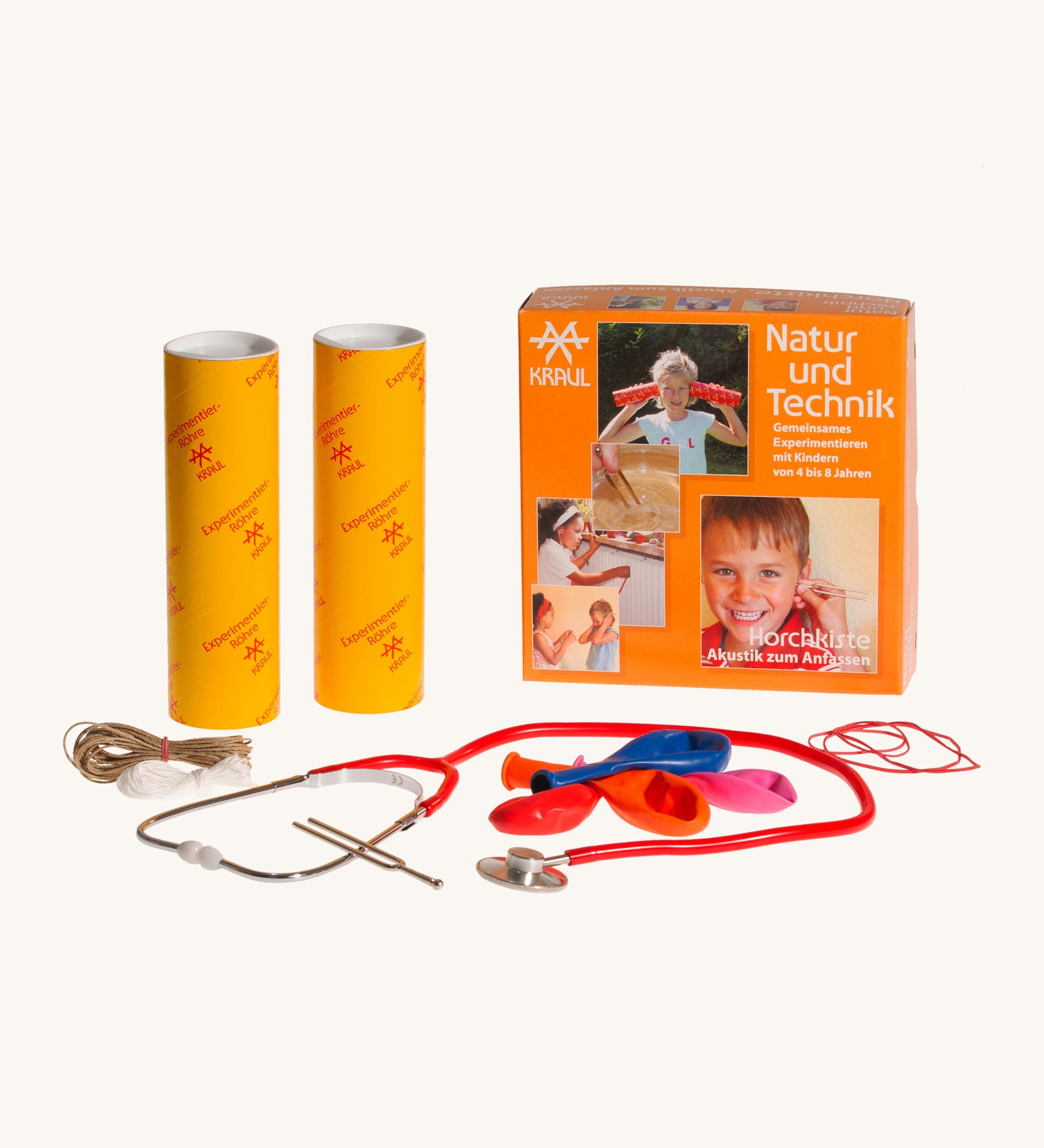 Kraul listening box kit showing the stethoscope, tuning fork, balloons, elastics, and string to make a string telephone and different listening experiments