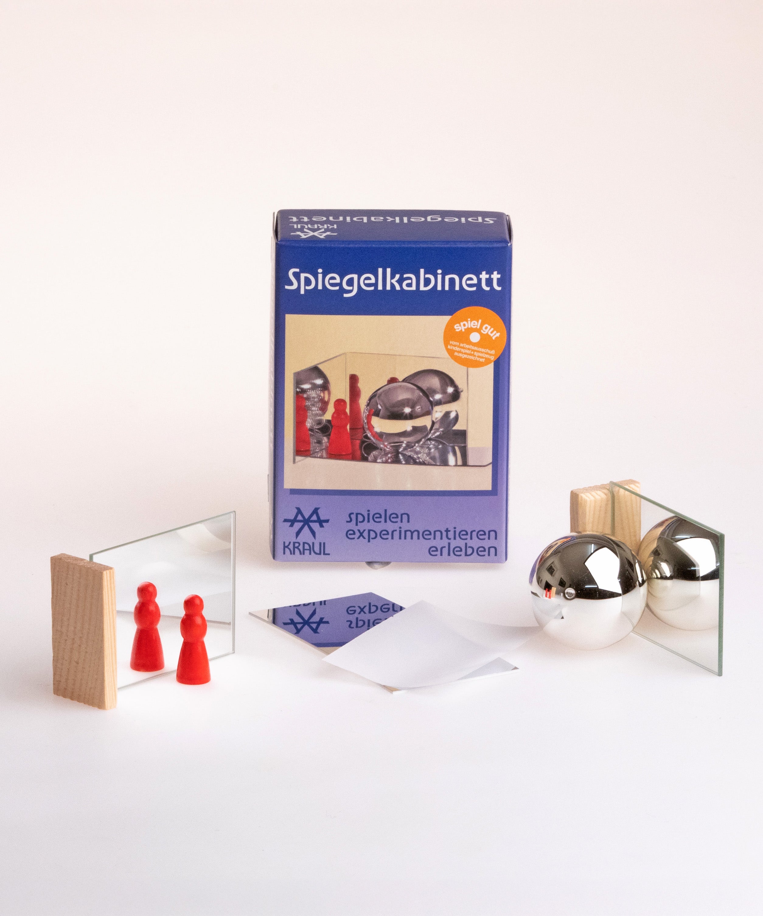 The Kraul kids mirror box set showing the different pieces which includes two mirrors, a flexible mirror and a reflective glass ball