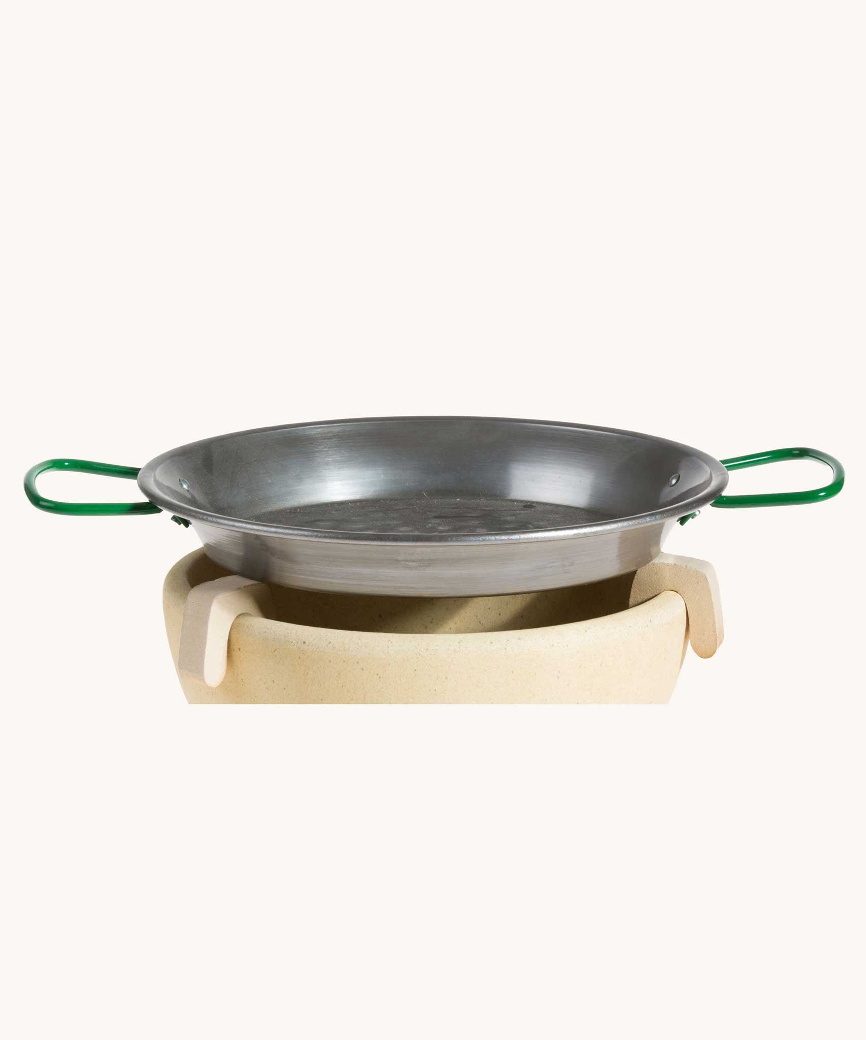 A metal Kraul Pan For us with the Kraul ceramic Fire Bowl. Kraul is available at Babipur their range of kits let children discover a world of wonder with Kraul STEM science kits and educational toys.