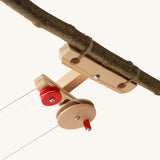 Kraul wooden top station kit for big cable cars shown tied to a branch.