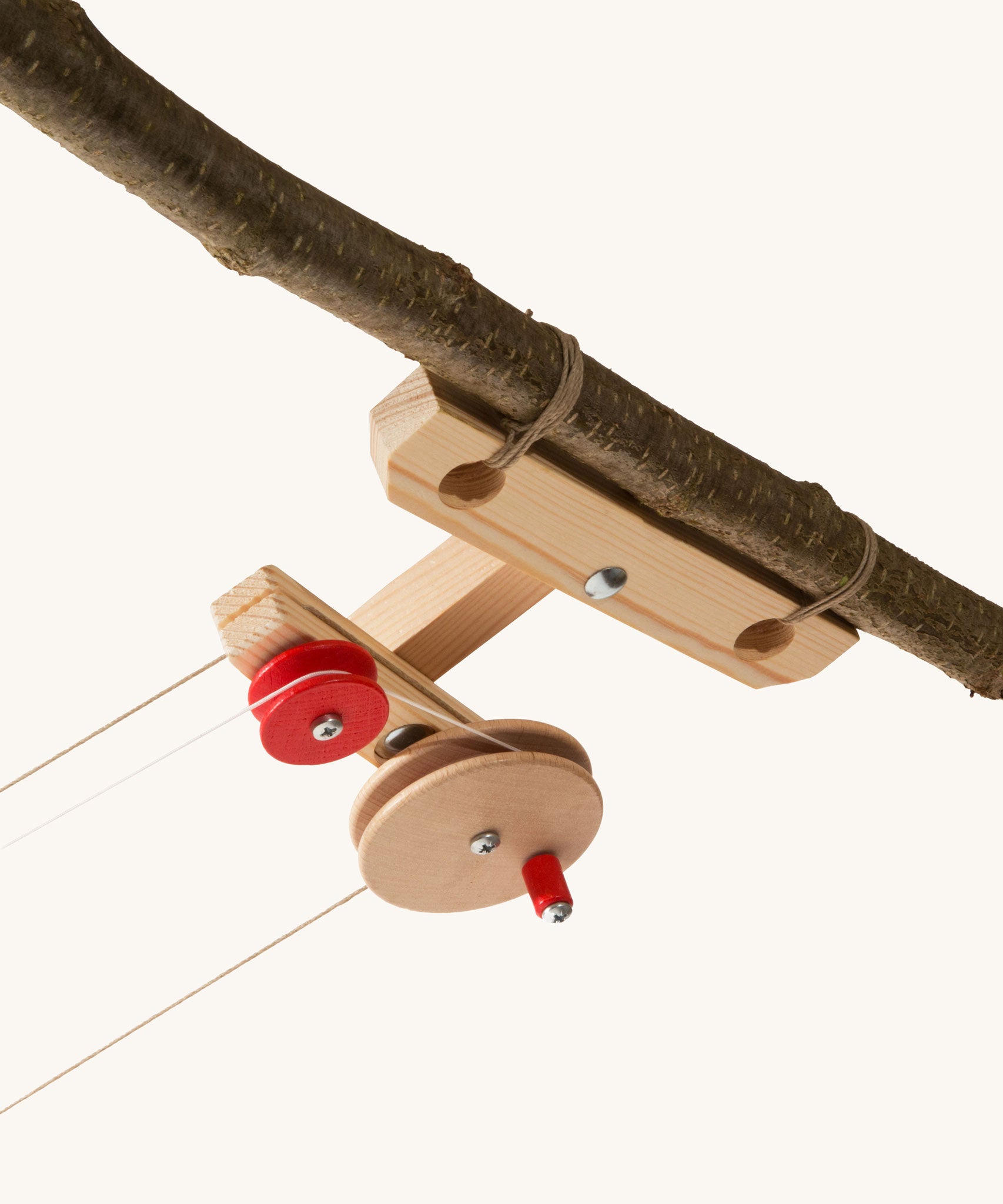 Kraul wooden top station kit for big cable cars shown tied to a branch.