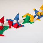 Four Kraul Tumbling Gnomes in various tumbling phases.