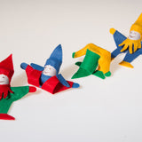 Four Kraul Tumbling Gnomes in various tumbling phases.