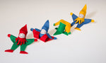 Four Kraul Tumbling Gnomes in various tumbling phases.