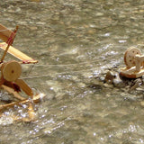 Kraul Wooden River Wheel being used in a river