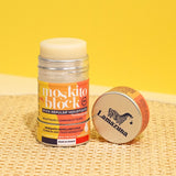 Lamazuna Moskito Block refillable natural mosquito repellent stick displayed with its aluminium lid on a woven surface, highlighting the citronella formula for common and tiger mosquitoes