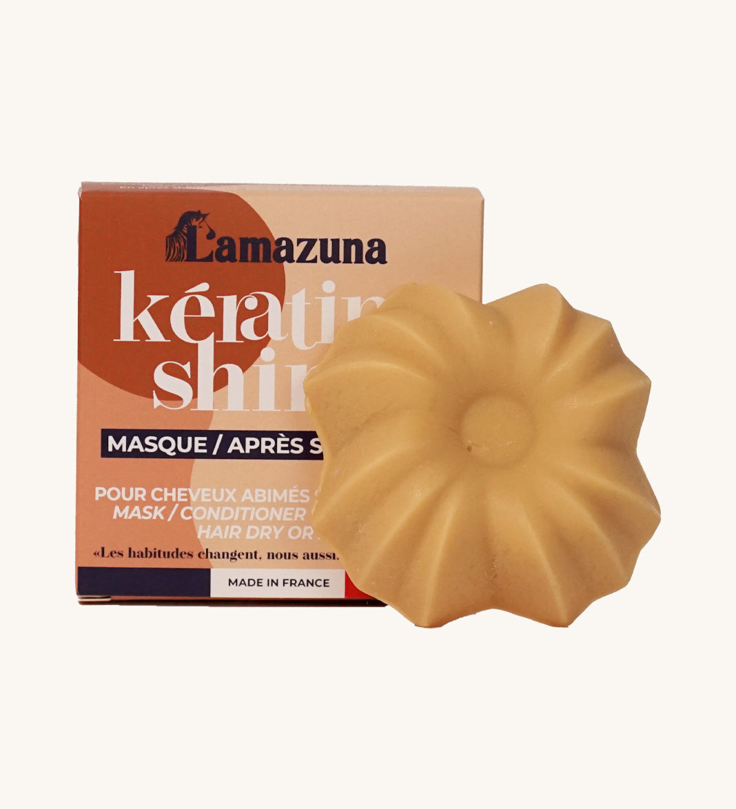 Lamazuna Keratin Shine solid conditioner bar displayed in front of its matching box packaging