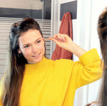 person using the Lamazuna Wooden Oriculi Ear Swab