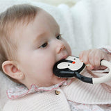 Baby chewing the Lanco Nui the Penguin Teether