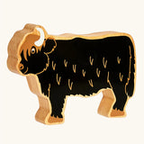 Lanka Kade black highland cow wooden toy figure. 