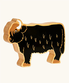 Lanka Kade black highland cow wooden toy figure. 