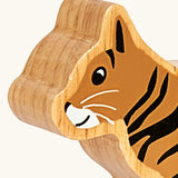 Close up of the painted facial features on the Lanka Kade Scottish wildcat wooden toy figure. 