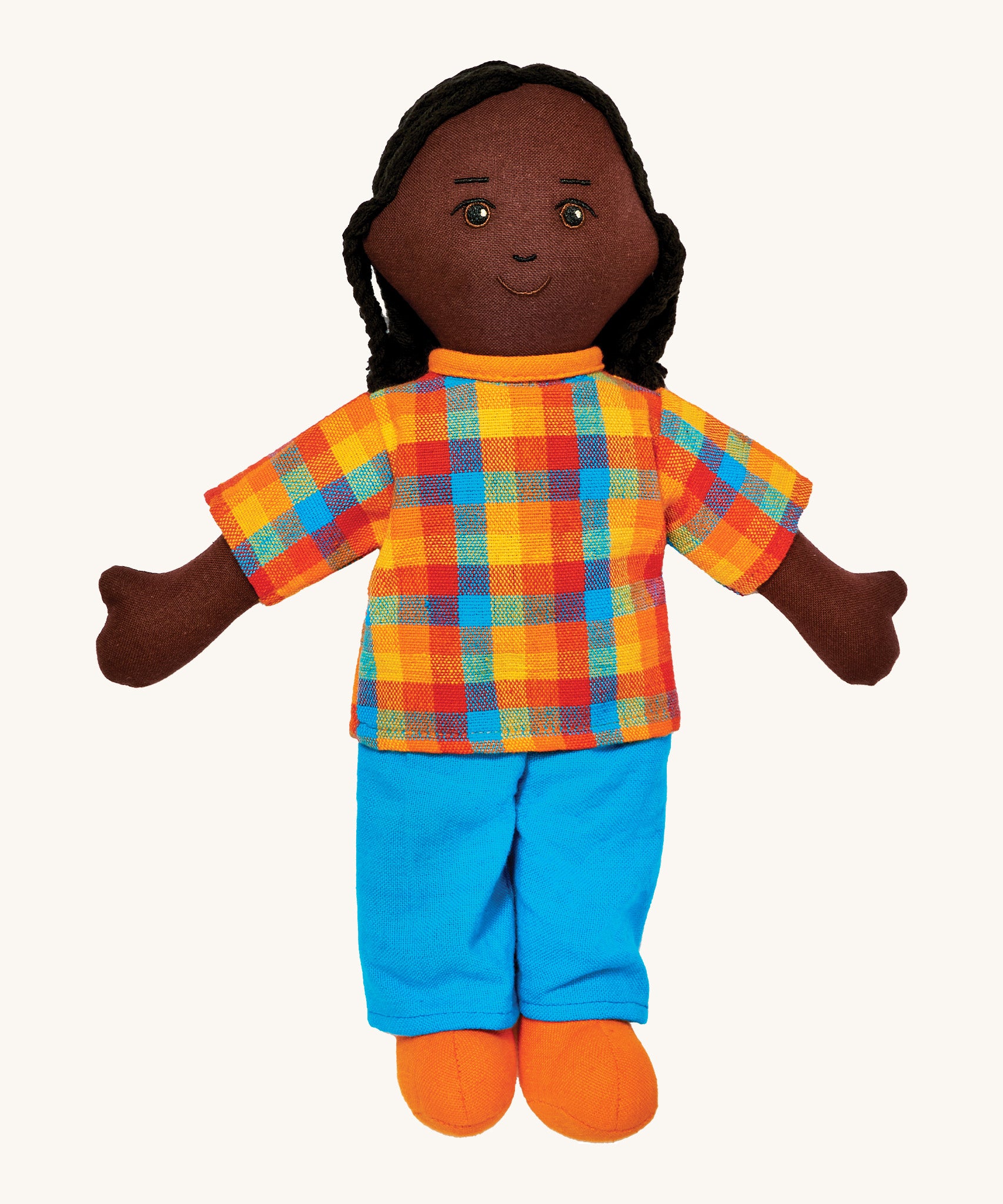 Lanka Kade dad doll with black skin and long black hair. Features a short sleeve top in a multicoloured check style, coloured trousers and stitched on shoes. 