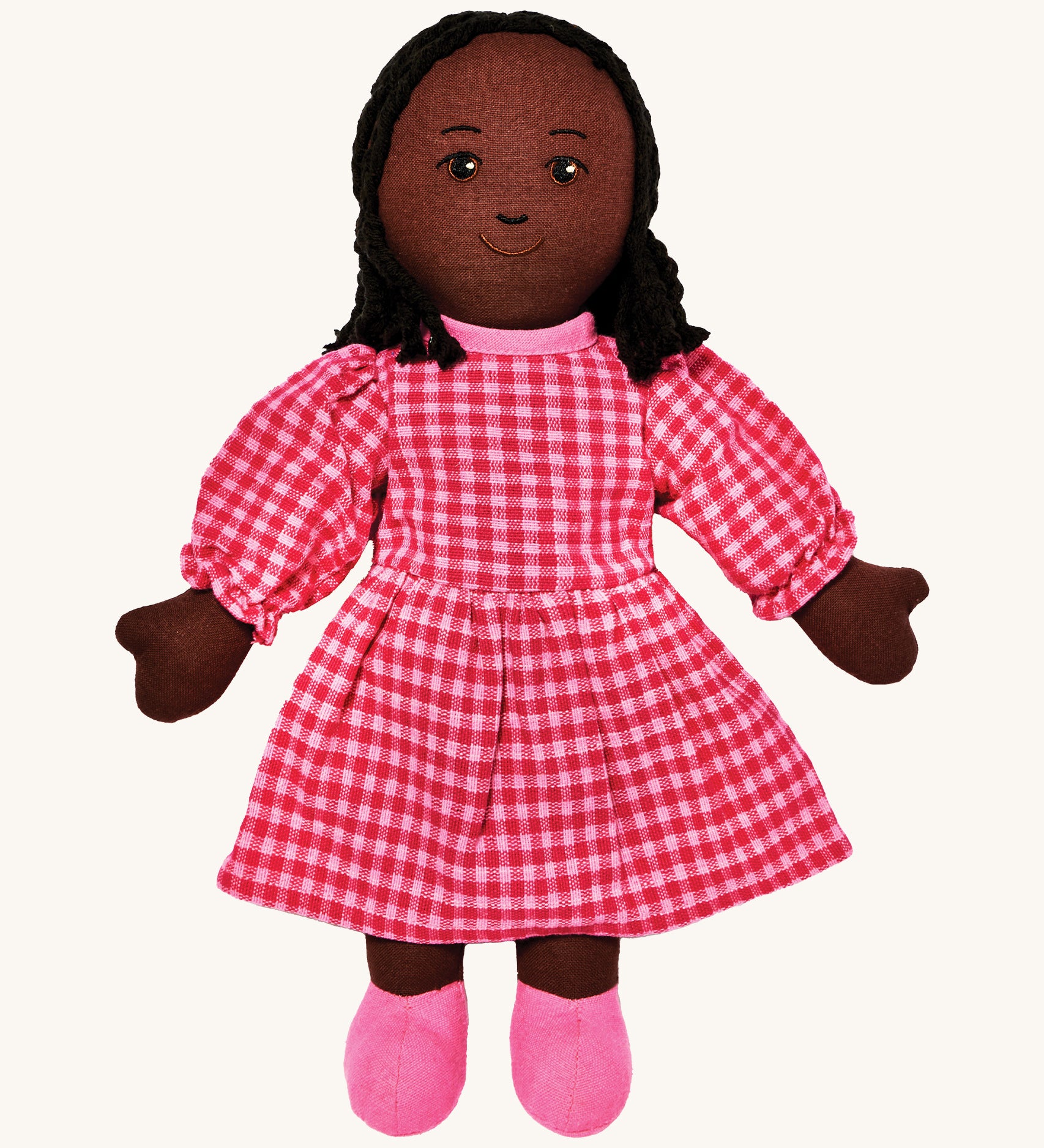Lanka Kade mum doll with black skin and long black hair. Features a long dress in a multicoloured check style and stitched on shoes. 