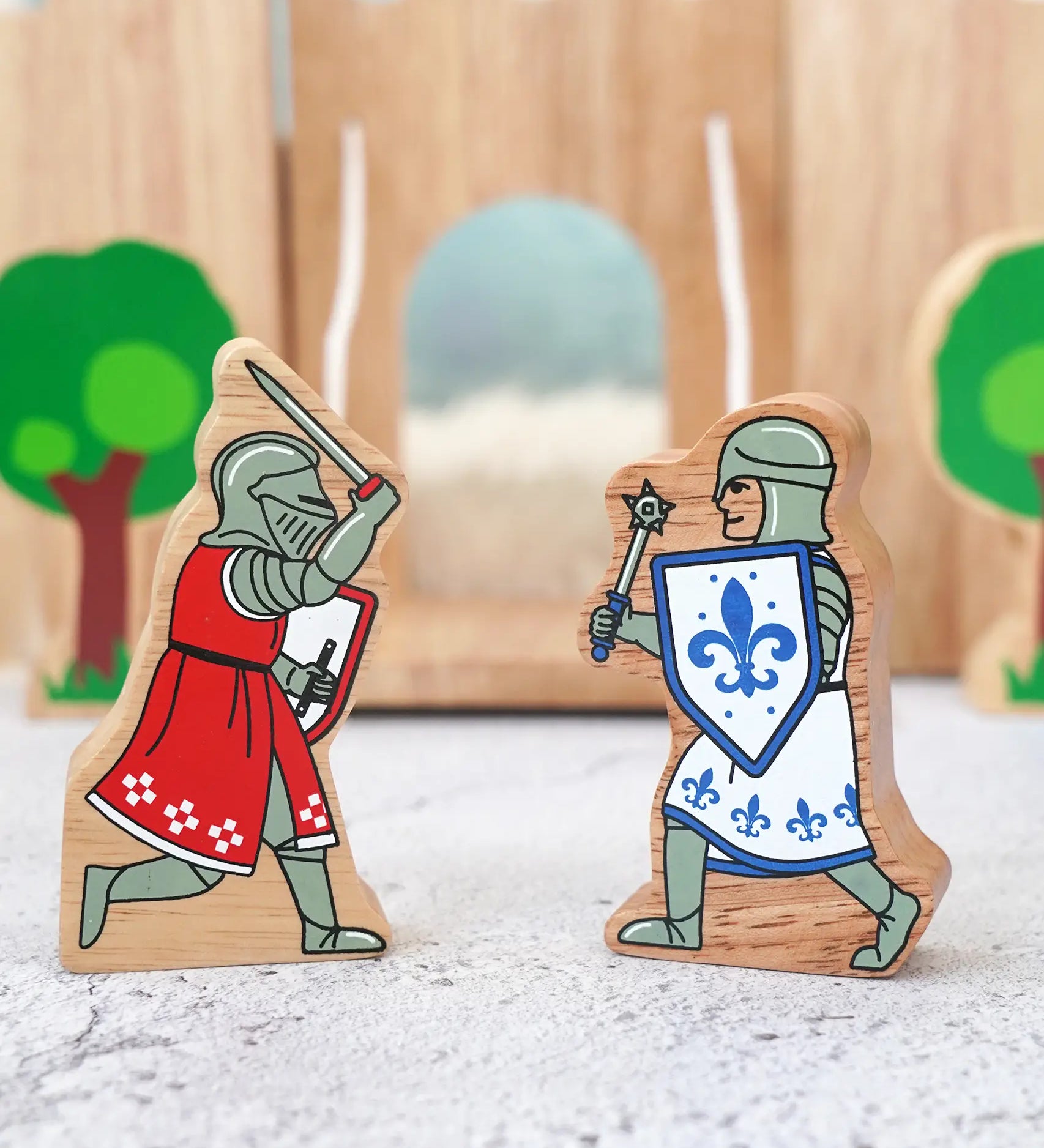 Lanka Kade wooden blue knight figure with morning star standing next to red knight with sword figure