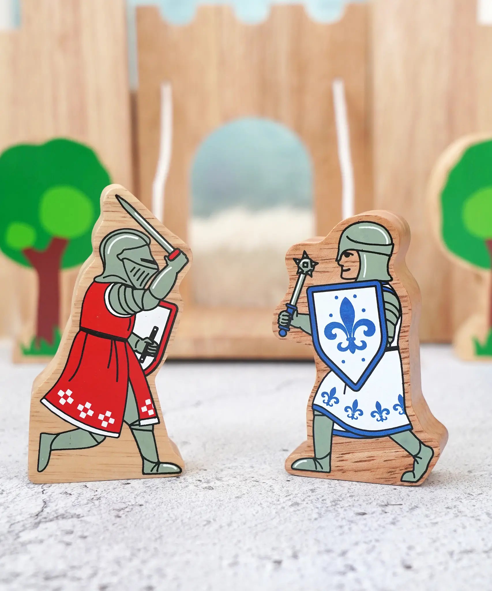Lanka Kade wooden blue knight figure with morning star standing next to red knight with sword figure