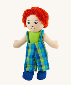 A Lanka Kade Boy Doll with White Skin and Red Hair.