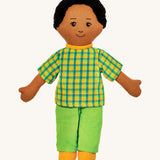 Lanka Kade dad doll with brown skin and black hair. Features a short sleeve top in a chequered style, coloured trousers and stitched on shoes. 