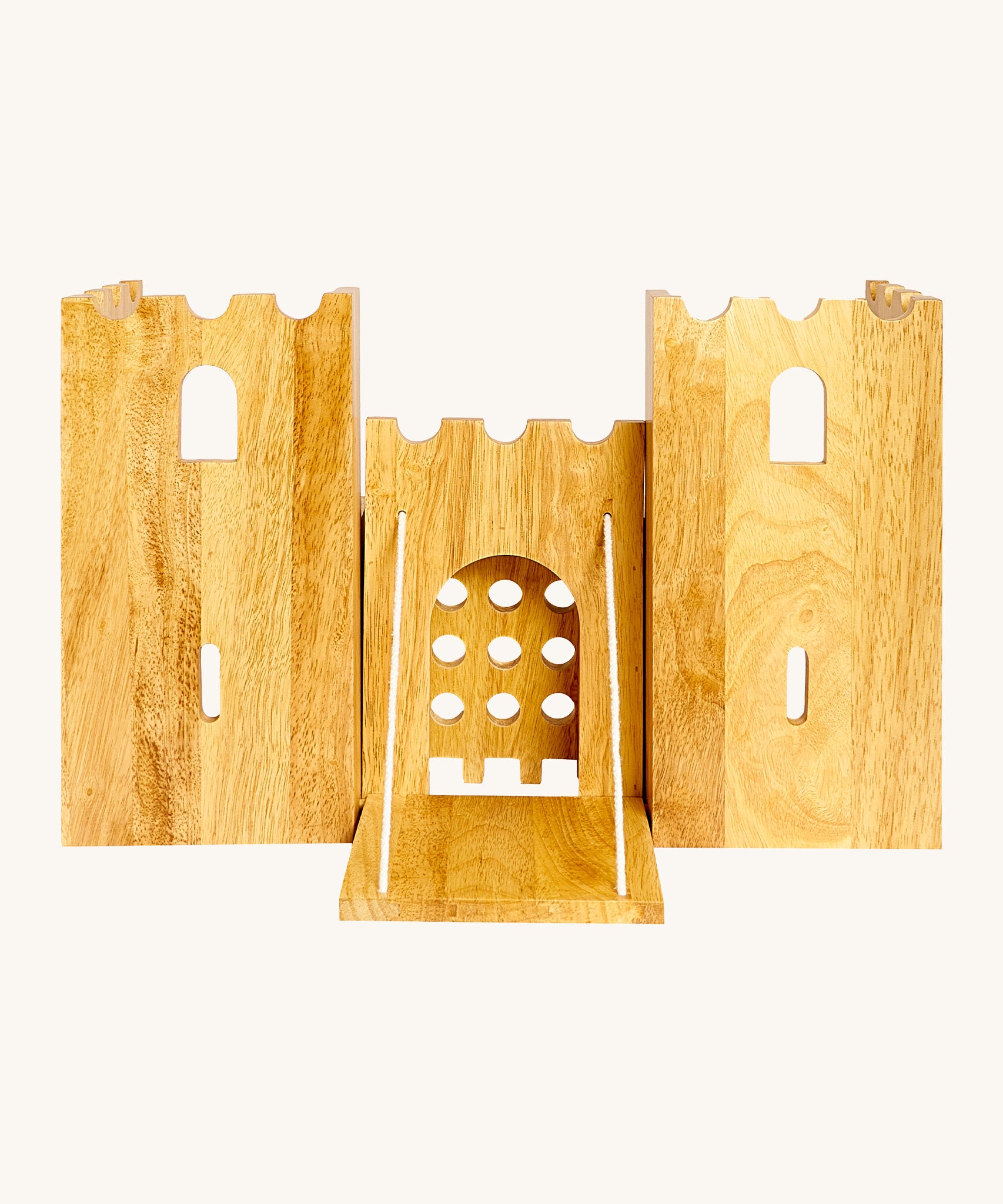 Front view of the wooden Lanka Kade castle showing the corner walls with window holes, the lowered drawbridge and gate. 