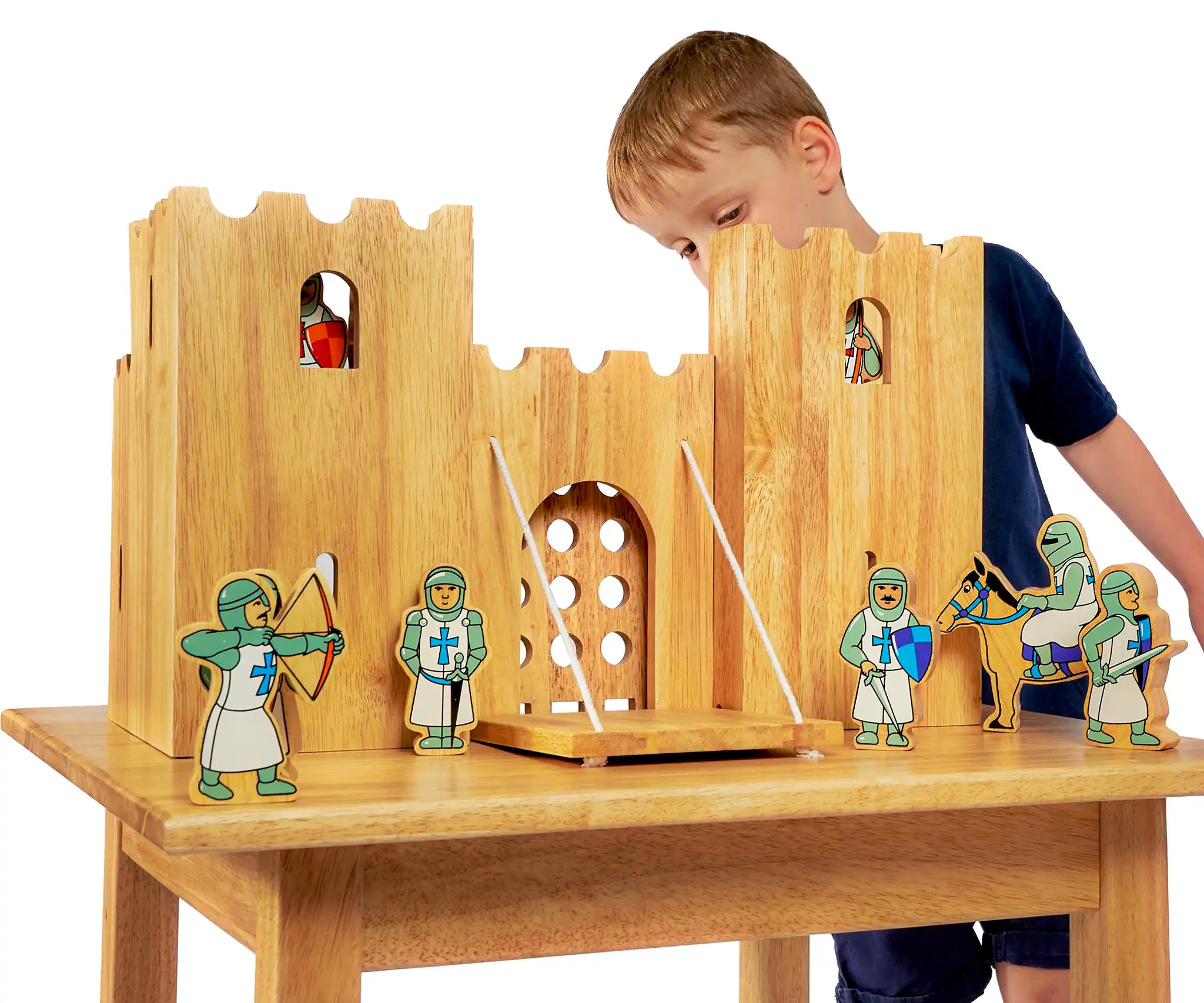 Child playing with the Lanka Kade Castle Play set & 12 Knights.
