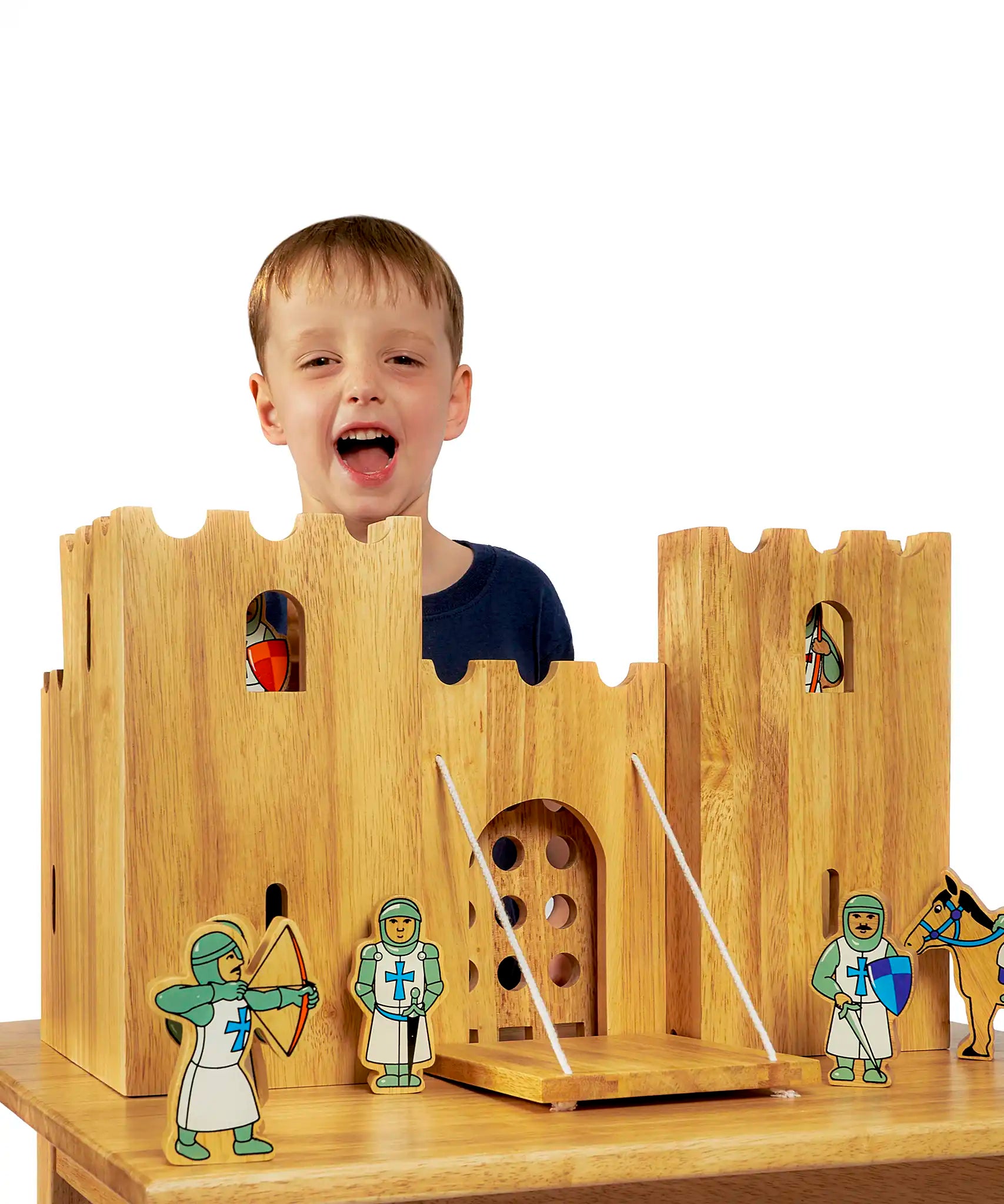 Child playing with the Lanka Kade Castle Play set & 12 Knights.