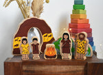 Lanka Kade Prehistoric Playset. A play set that contains 8 wooden figure and scenery pieces. These wooden toy figures are part of a huge range of Lanka Kade fair trade, wooden toys available here at Babipur.