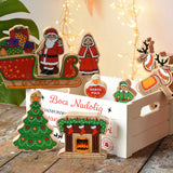 Lanka Kade wooden Christmas play set. 10 toy figures including Father Christmas,  red sleigh, Mrs Clause, Wrapped presents, festive fireplace, Christmas Tree, North Pole Sign, Elf and 2 Reindeer placed on a wooden crate box.