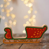 Lanka Kade red Christmas sleigh wooden wooden toy figure.