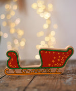 Lanka Kade red Christmas sleigh wooden wooden toy figure.