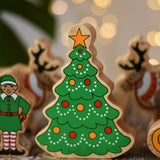 Lanka Kade Christmas tree wooden toy figure painted with red and yellow baubles and a yellow star on the top.
