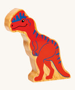 The Lanka Kade Dilophosaurus dinosaur figure, a chunky natural rubberwood toy ethically made in Sri Lanka.