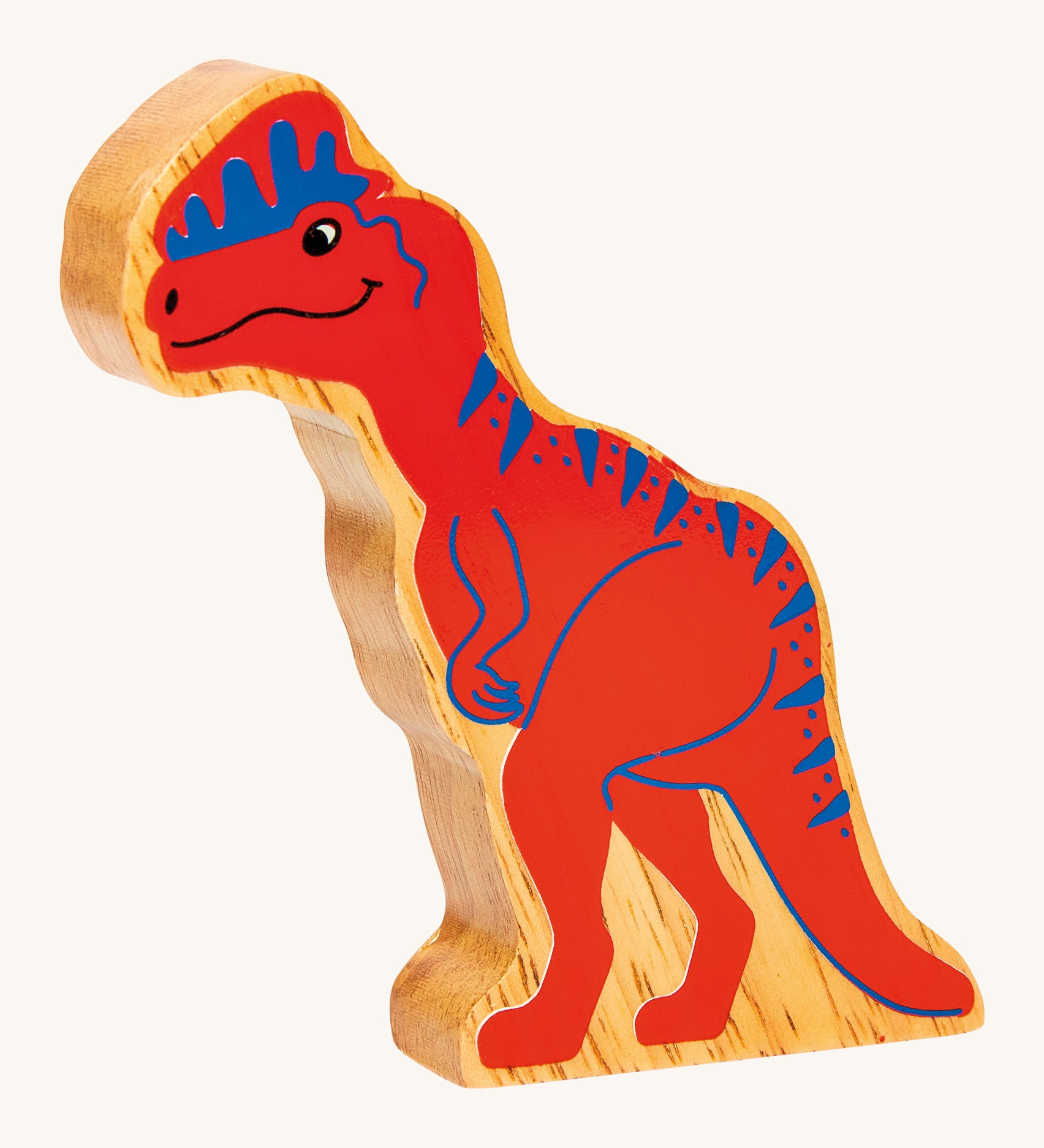 The Lanka Kade Dilophosaurus dinosaur figure, a chunky natural rubberwood toy ethically made in Sri Lanka.
